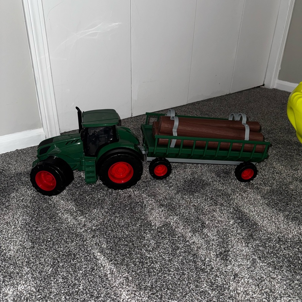 Green and Red Toy Tractor with Trailer